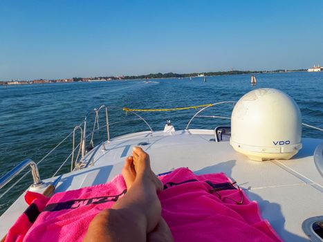 relaxing on the boat during a trip to the venice