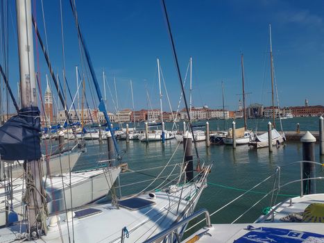 the pier in venice is full with boats