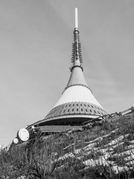 Jested - unique architectural building. Hotel and TV transmitter on the top of Jested Mountain, Liberec, Czech Republic. Black and white image.