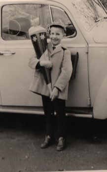 Old family photo in black and white
Beginning of school year Anno 1965, black and white photograph in retro style.