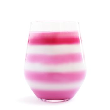 Beautiful pink striped jello dessert in glass isolated on white background