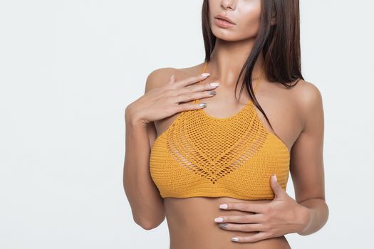 studio photo of posing sexy woman with nice lingerie on white background