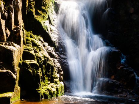 Kamienczyk waterfall near SzklarskaPoreba in Giant mountains or Karkonosze, Poland. Long time exposure.