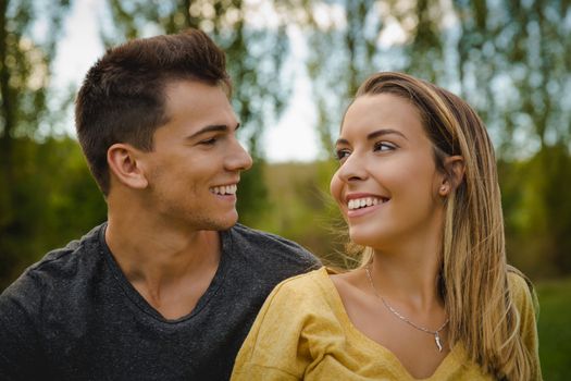 Portrait of a young beautiful couple smiling