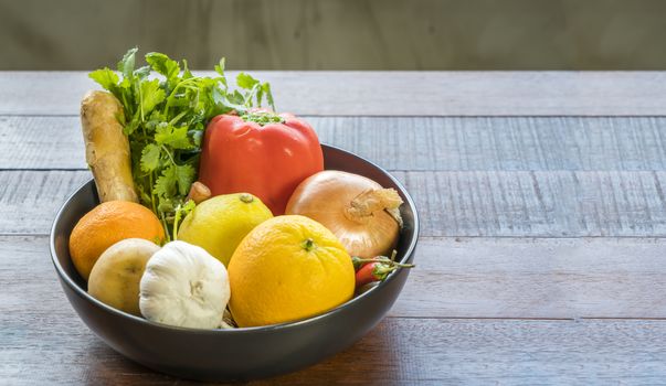 Fresh vegetables in a tray, Courgettes, onion, orange, lemon, tomato, potato