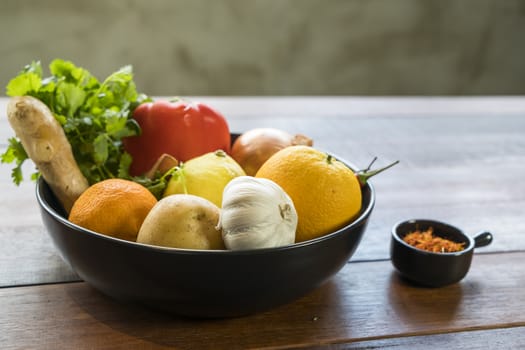 Fresh vegetables in a tray, Courgettes, onion, orange, lemon, tomato, potato