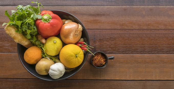 Fresh vegetables in a tray, Courgettes, onion, orange, lemon, tomato, potato