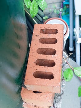 close up macro of an unused single red brick; Essex; UK