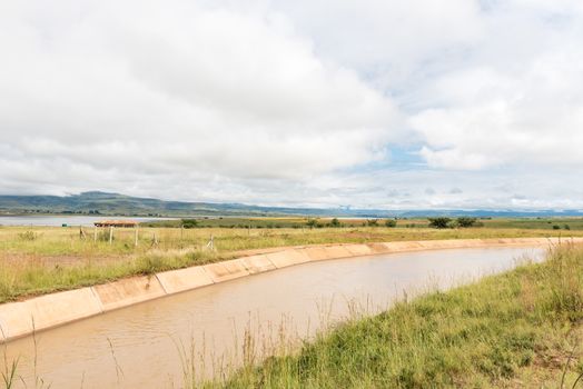 The Tugela-Vaal Water Scheme canal, built in 1995, at the Woodstock Dam Near Bergville in the Kwazulu-Natal Province
