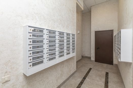 Empty hall luxury interior with mailboxes on wall