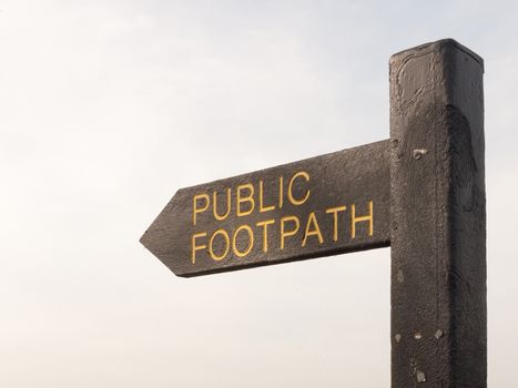 close up of black wooden public footpath sign way trail; essex; england; uk