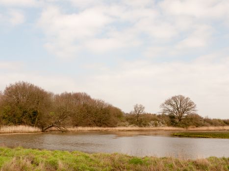 open water stream valley field nature farmland country outside skies beautiful; essex; england; uk