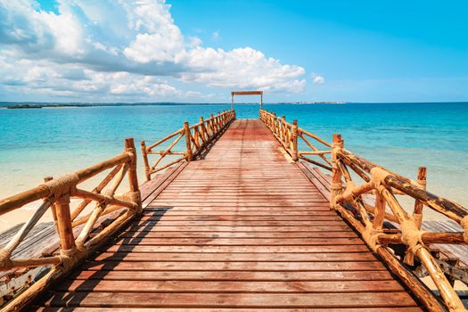 Wooden pier at Prison island near Zanzibar,  Beautiful turquoise water and white sand near Zanzibar, Tanzania