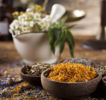 Natural medicine on wooden table background