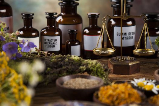 Natural medicine on wooden table background