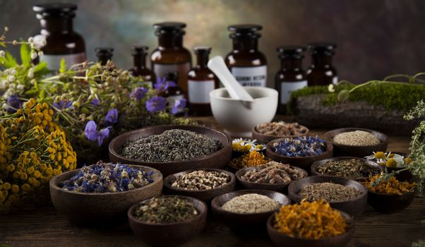 Natural medicine on wooden table background