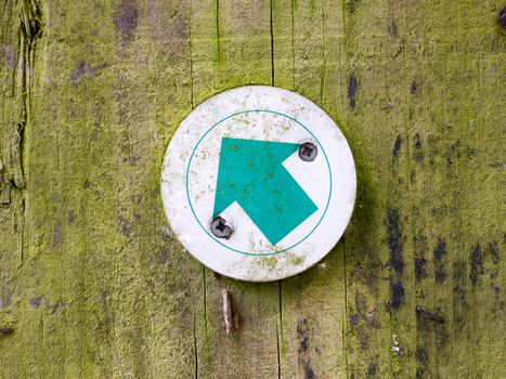 walk way in forest green point direction sign arrow; Essex; UK