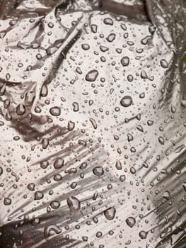 water close drops up on a black bin bag; Essex; UK