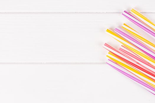 Multicolor cocktail tubes on white background. Close up