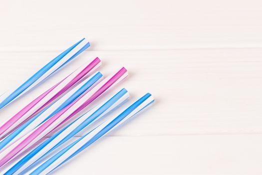 Multicolor cocktail tubes on white background. Close up