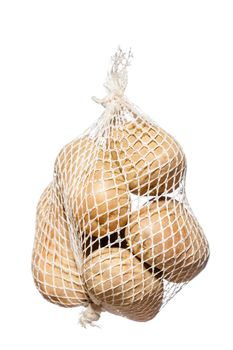 bunch fresh potatoes in a white mesh bag