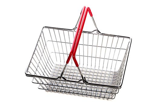 tiny metal shopping basket against white background