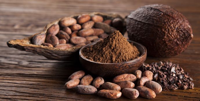 Cocoa pod on wooden background