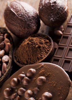 Cocoa pod and chocolate bar and food dessert background