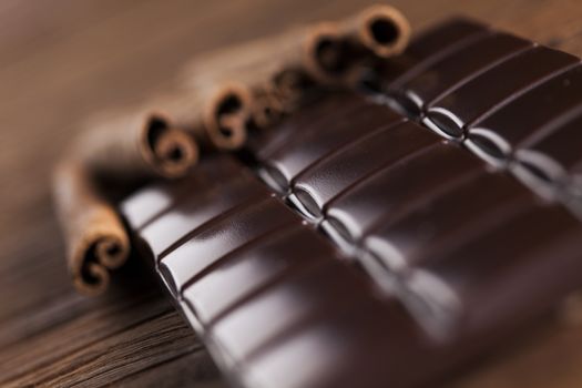 Bars Chocolate , candy sweet, dessert food on wooden background