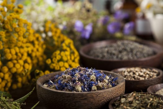 Natural medicine on wooden table background