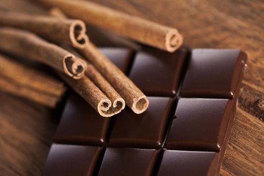 Bars Chocolate , candy sweet, dessert food on wooden background