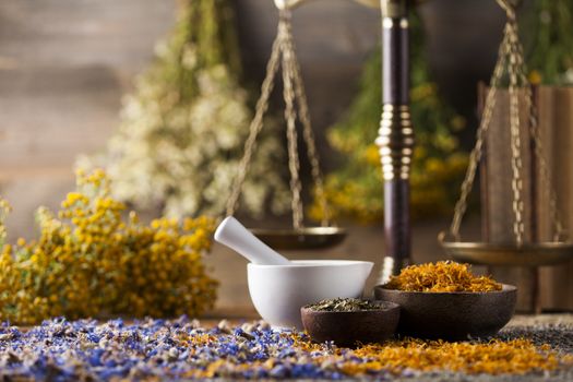 Natural medicine on wooden table background