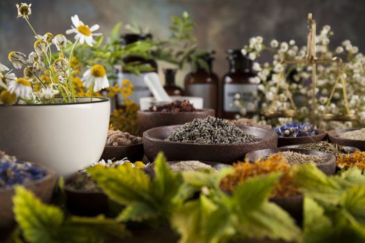 Herbal medicine on wooden desk background