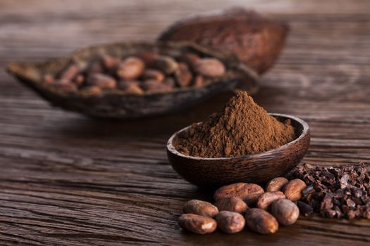 Cocoa pod on wooden background