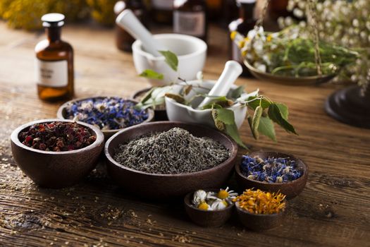 Herbal medicine on wooden desk background