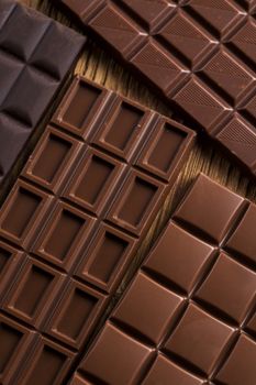 Chocolate , candy sweet, dessert food on wooden background