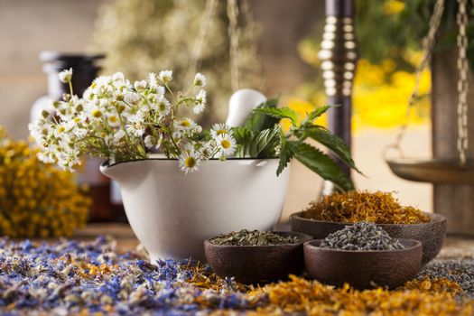 Natural medicine on wooden table background