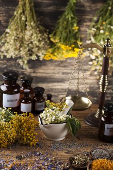 Natural medicine on wooden table background