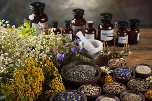 Natural medicine on wooden table background