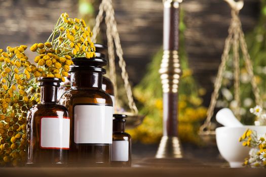 Herbal medicine on wooden desk background