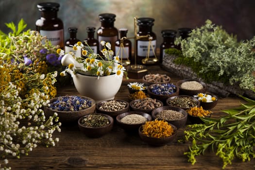 Natural medicine on wooden table background