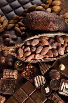 Chocolate sweet, cocoa pod and food dessert background