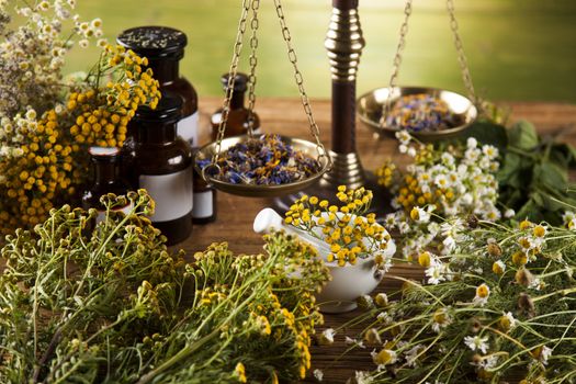 Herbal medicine on wooden desk background