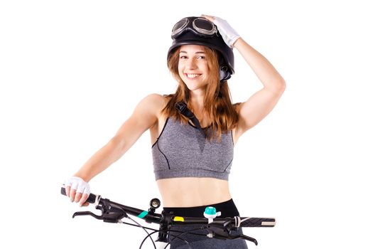 girl with a mountainbike wearing an us army style aviation helmet