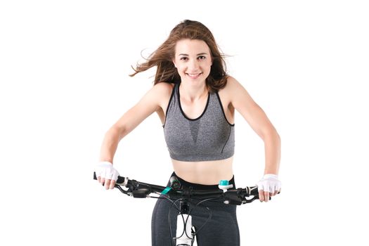 girl posing with her mountainbike against white background