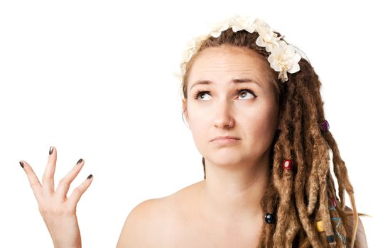 portrait of a confused caucasian girl with dreadlocks hairstyle