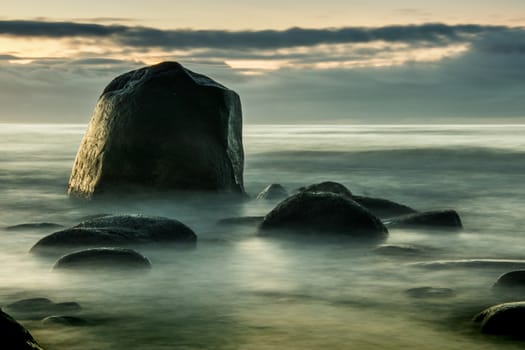 Rocks in ocean at a beach in Southwest-part of Norway