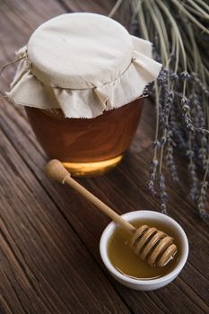 Fresh honey on wooden table