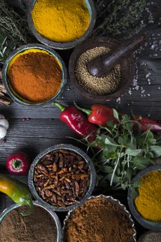 Spices over wooden background