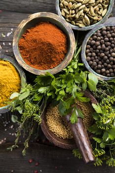 Wooden table of colorful spices